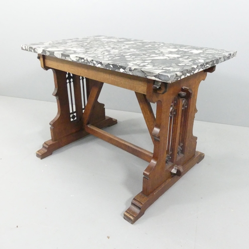 2052 - An early 20th century centre table, with polished Marinace granite top on gothic oak trestle base. 1... 