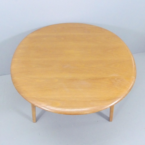 2056 - A mid-century elm drop-leaf dining table, 111x73x64cm (extending to 125cm), with four matching chair... 