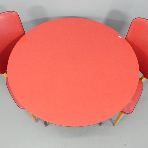 2059 - A mid-century circular formica topped table on ebonised legs, with a pair of similar chairs. 90x76cm... 