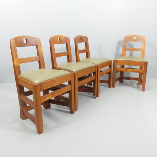 2077 - A set of four Brutalist teak dining chairs with leather upholstered seats.