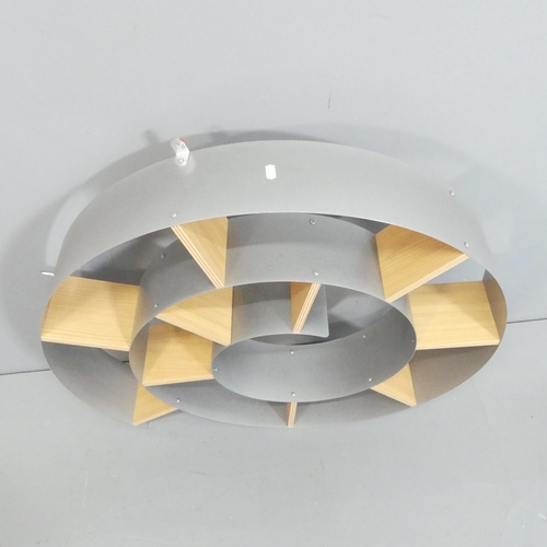 2081 - A modern CD rack in the form of a snail. Diameter 82cm, depth 18cm.