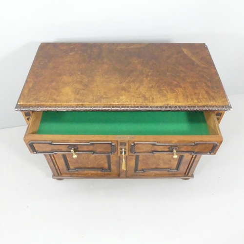 2140 - A 19th century figured walnut veneered sideboard, with applied ebonised carved decoration, two drawe... 