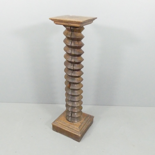 2141 - A French elm spiral turned column. 30x120cm.