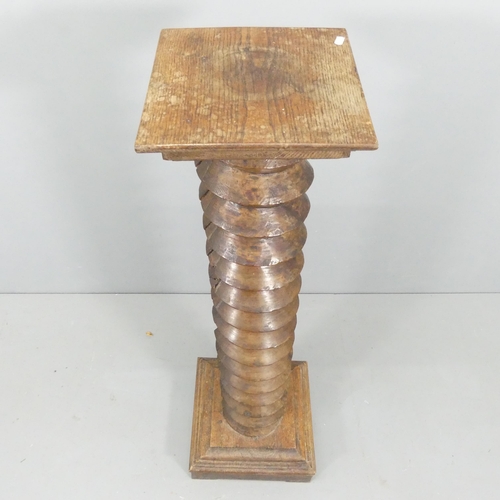 2141 - A French elm spiral turned column. 30x120cm.