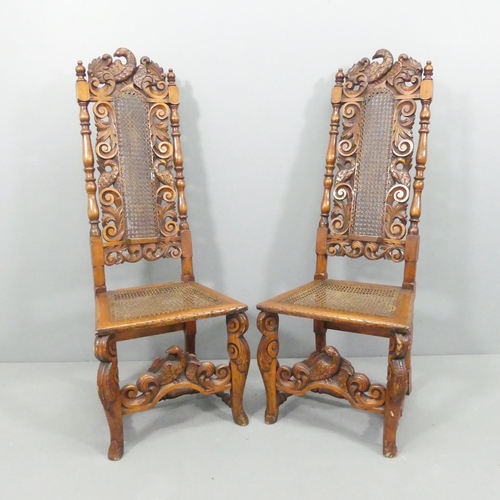 2143 - A pair of 19th century yew-wood and mahogany Carolean style hall chairs, with cane panelled backs an... 