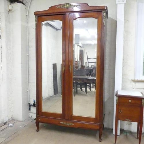 2147 - A French mahogany armoire, with two mirror doors and shelf fitted interior. 120x222x47cm,