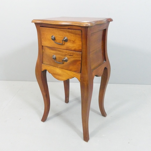 2167 - A French mahogany bedside chest, with two drawers and raised on cabriole legs. 38x69x31cm.