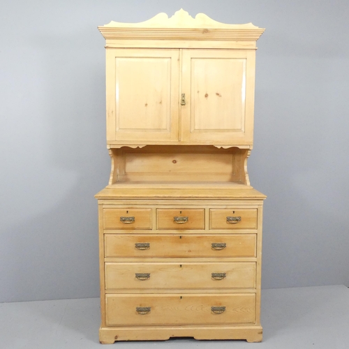 2177 - A vintage pine two-section dresser, with two panelled doors above three short and three long drawers... 