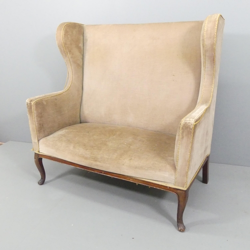 2178 - A Victorian mahogany and upholstered two-seater wingback settee. 126x126x70cm