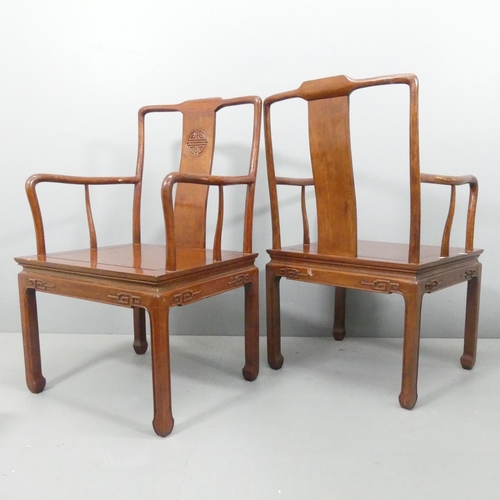 2183 - A pair of modern hardwood Chinese open armchairs, with applied carved decoration.