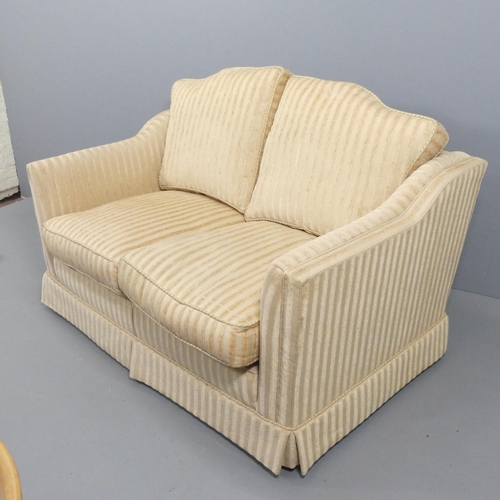 2188 - A contemporary upholstered two-seater sofa. Overall 153x95x105, seat 120x50x60cm.