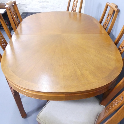 2192 - A modern Chinese hardwood draw-leaf extending dining table with two spare leaves, 167x78x112cm, and ... 