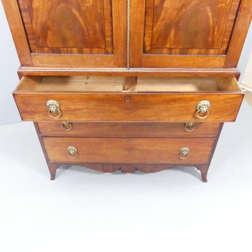 2197 - A 19th century mahogany and ebony-strung two-section linen press, the top section with two panelled ... 