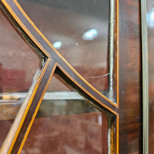 120 - Early 19th century mahogany secretaire library bookcase on chest, with strung lattice glazed doors, ... 