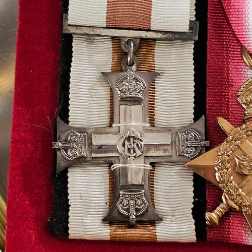 154 - A framed group of 9 Great War and Second War Service medals, including Military Cross awarded to F L... 