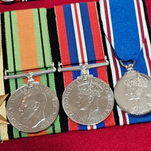 154 - A framed group of 9 Great War and Second War Service medals, including Military Cross awarded to F L... 