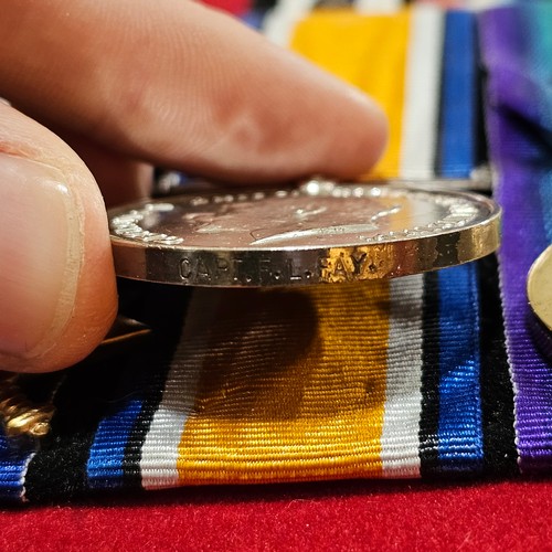 154 - A framed group of 9 Great War and Second War Service medals, including Military Cross awarded to F L... 