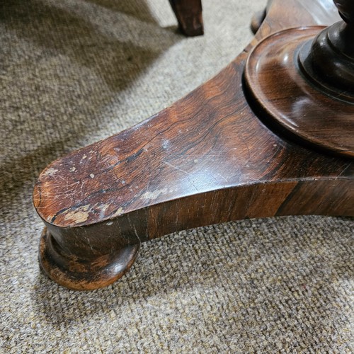 117 - A 19th century rosewood duet music stand, with brass candle brackets, adjustable column and platform... 