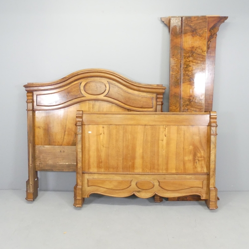 2513 - A French walnut 4' double bed, with size rails and slats. Headboard dimensions 136x134x13cm.