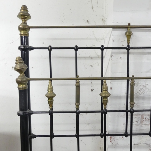 2521 - A Victorian cast iron 4' double bed, with side rails (no slats). Headboard 140x156cm.