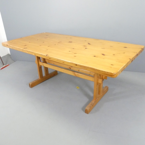 2533 - A modern pine trestle dining table. 182x72x92cm.