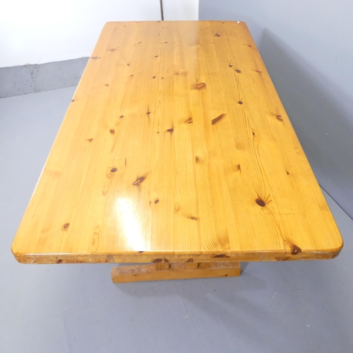 2533 - A modern pine trestle dining table. 182x72x92cm.