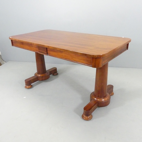 2553 - A Victorian mahogany writing table. 133x72x70cm.