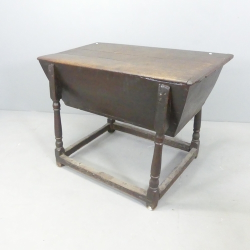 2557 - A 19th century oak dough bin. 95x71x61cm.