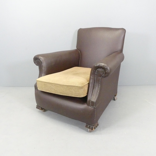 2566 - A brown studded faux-leather upholstered club armchair. Overall 88x85x90cm, seat 49x42x60cm.