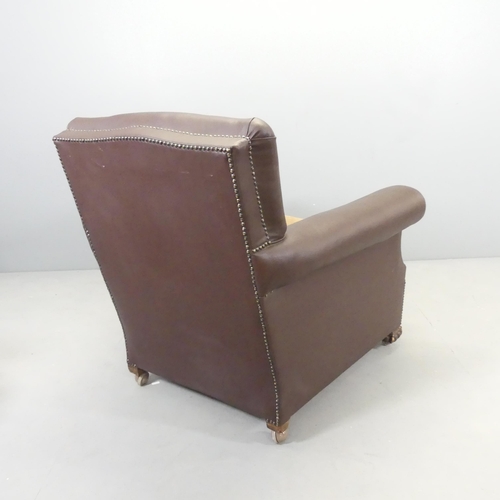 2566 - A brown studded faux-leather upholstered club armchair. Overall 88x85x90cm, seat 49x42x60cm.