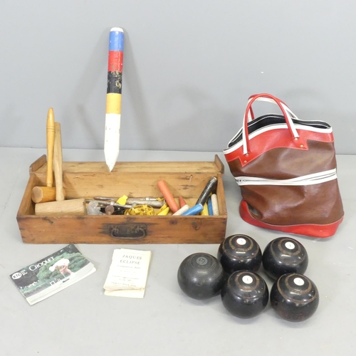 2581 - Five varous lawn bowls, and a part Jaques Eclipse croquet set.