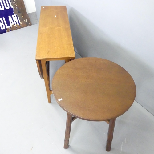 2643 - A modern oak circular occasional table in the manner of Heals, 61x71cm, and a mid-century teak drop-... 