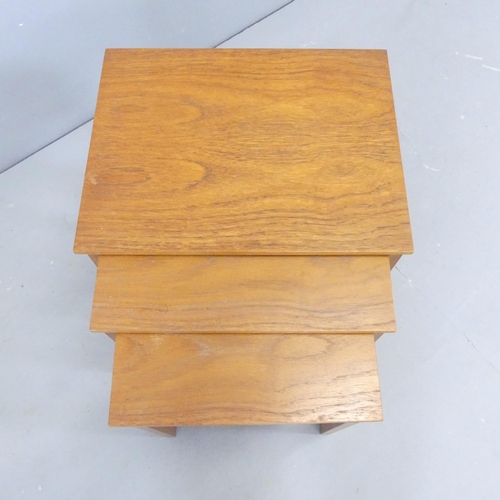 2665 - HERBERT E. GIBBS - a mid-century nest of three teak occasional tables. Largest 46x46x36cm.