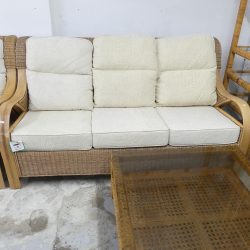 2500 - A contemporary Daro Waterford rattan and upholstered conservatory suite comprising a three seater so... 