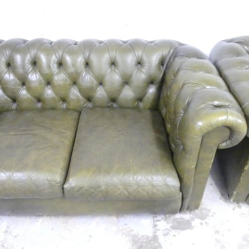 2502 - A three-seater green button-back leather upholstered Chesterfield style sofa. Overall 200x70x90, sea... 