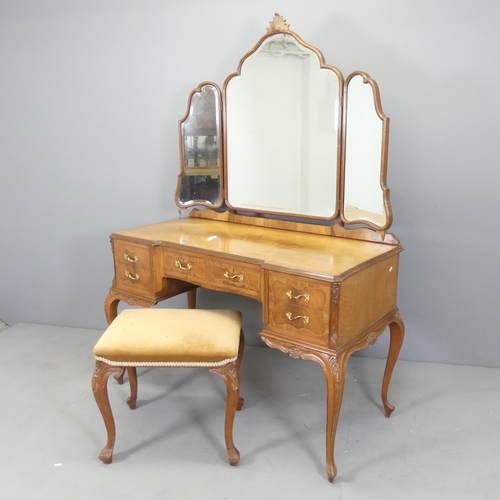 2510 - A French cross-banded walnut and satinwood strung dressing table, with three-fold mirror back, six d... 