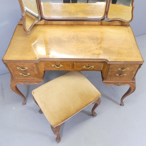 2510 - A French cross-banded walnut and satinwood strung dressing table, with three-fold mirror back, six d... 