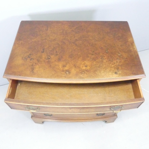 2526 - A 19th century walnut bow-front chest of four long drawers, raised on bracket feet. 79x85x51cm.