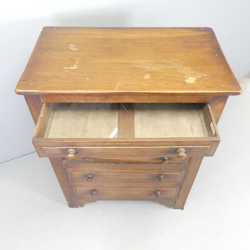 2528 - An early 20th century oak chest of five long drawers, retailed by Bobby & Co of Folkstone (label to ... 