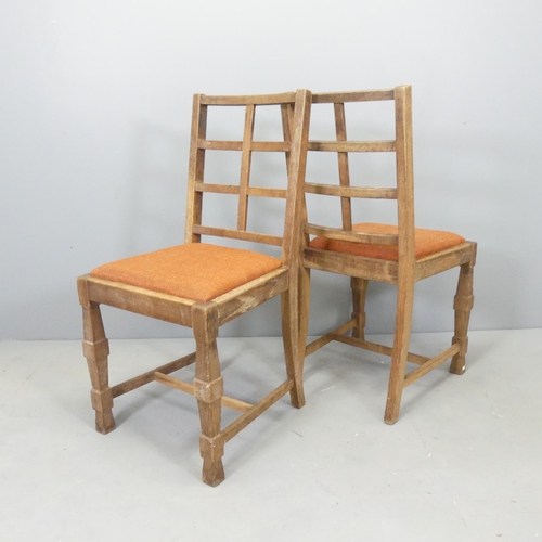 2539 - A pair of oak lattice back Cotswold School side chairs in the manner of Heals.