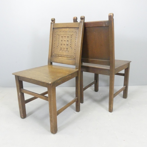 2541 - A set of six oak Pugin style dining chairs, with carved arms of the Palace of Westminster to back pa... 