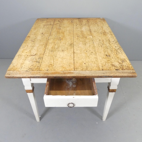 2542 - A pine scrub top kitchen table on painted base, with end frieze drawer and raised on square tapered ... 