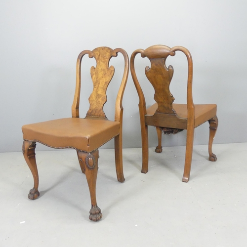 2545 - A set of four Victorian walnut dining chairs, with later faux-leather upholstery, shaped backs and l... 