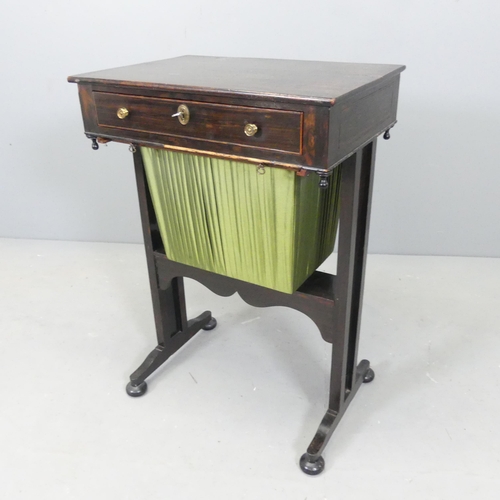 2549 - A Victorian ebonised sewing table, with single frieze drawer and slide under. 50x73x35cm.