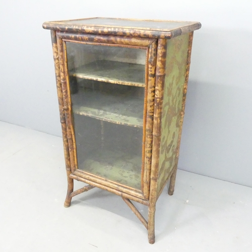 2558 - An antique bamboo display cabinet, with lacquered and painted top, two shelves and single glazed doo... 