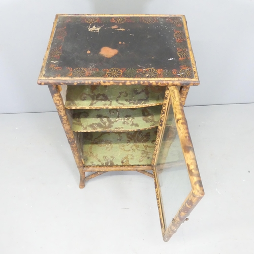 2558 - An antique bamboo display cabinet, with lacquered and painted top, two shelves and single glazed doo... 