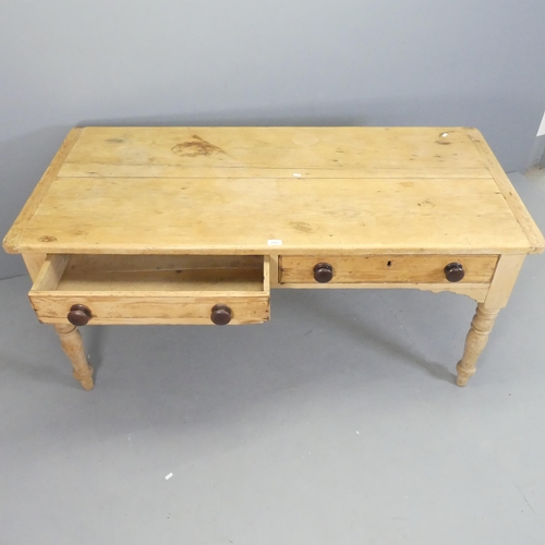 2561 - An antique pine farmhouse dining table, with two drawers and raised on turned legs. 152x72x71cm.