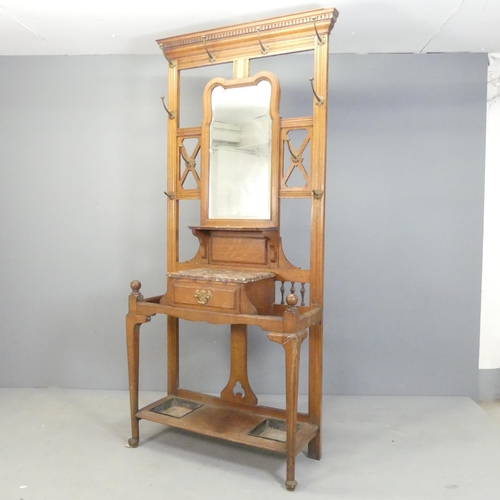 2570 - A Victorian Arts & Crafts oak hallstand. 90x203x35cm.