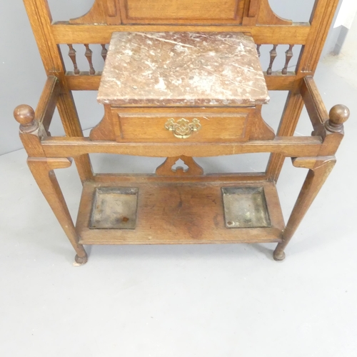 2570 - A Victorian Arts & Crafts oak hallstand. 90x203x35cm.