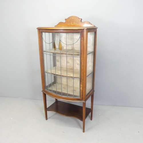 2571 - An Edwardian mahogany and satinwood strung display cabinet, with lattice glazed door and two shelves... 